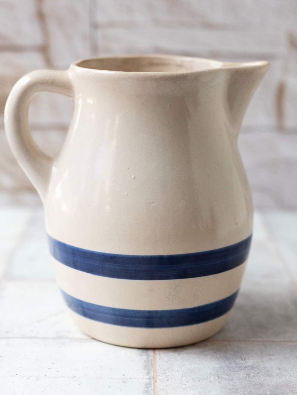 Vintage stoneware blue striped pottery pitcher 6 inches tall unmarked